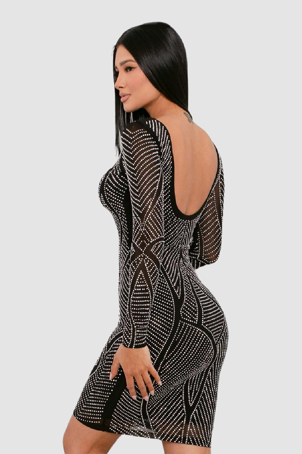 Black long sleeve cocktail mini dress with all over silver crystals. Very classy, yet sexy with an open back.