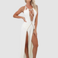 Vie Sauvage White jumpsuit with silver crystal trim and open legs. Fabric has a lot of stretch and adapts to your body. Open back.
