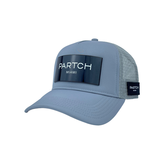 Partch luxury trucker hat in grey logomania logo