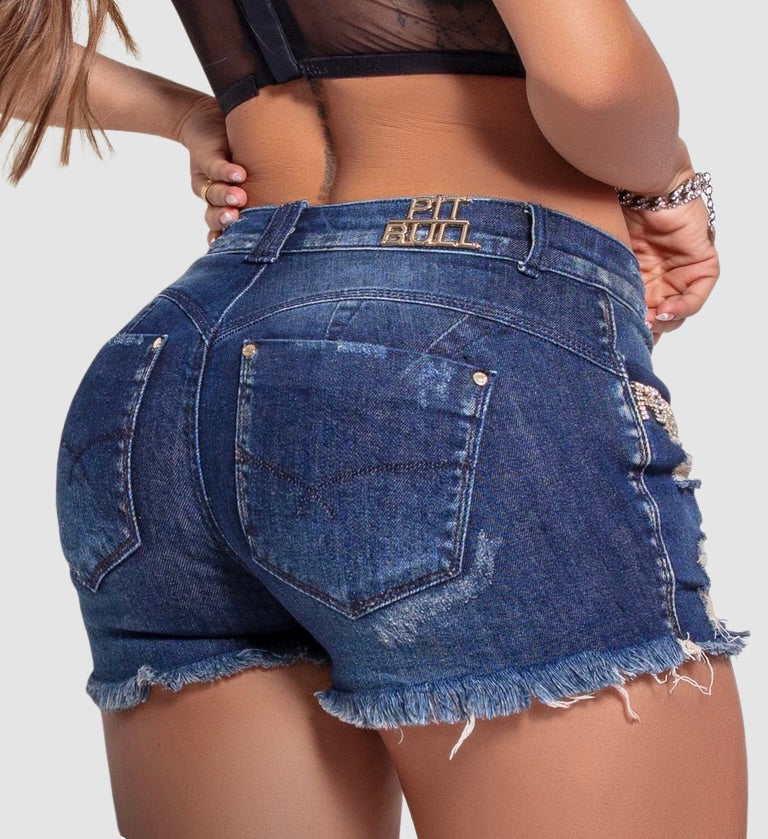 These navy denim shorts feature silver crystals, adding sparkle and flair to any look.  PIT BULL JEANS